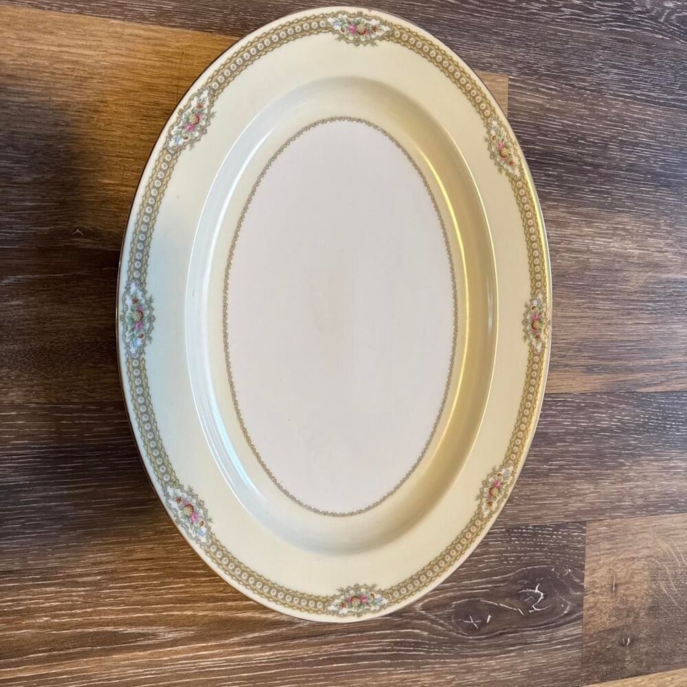 Noritake Cream and White Dinnerware